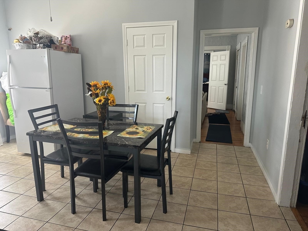 82 Fox Street Worcester, MA 01604 - Photo 6 of 38 a view of a dining room with furniture and window