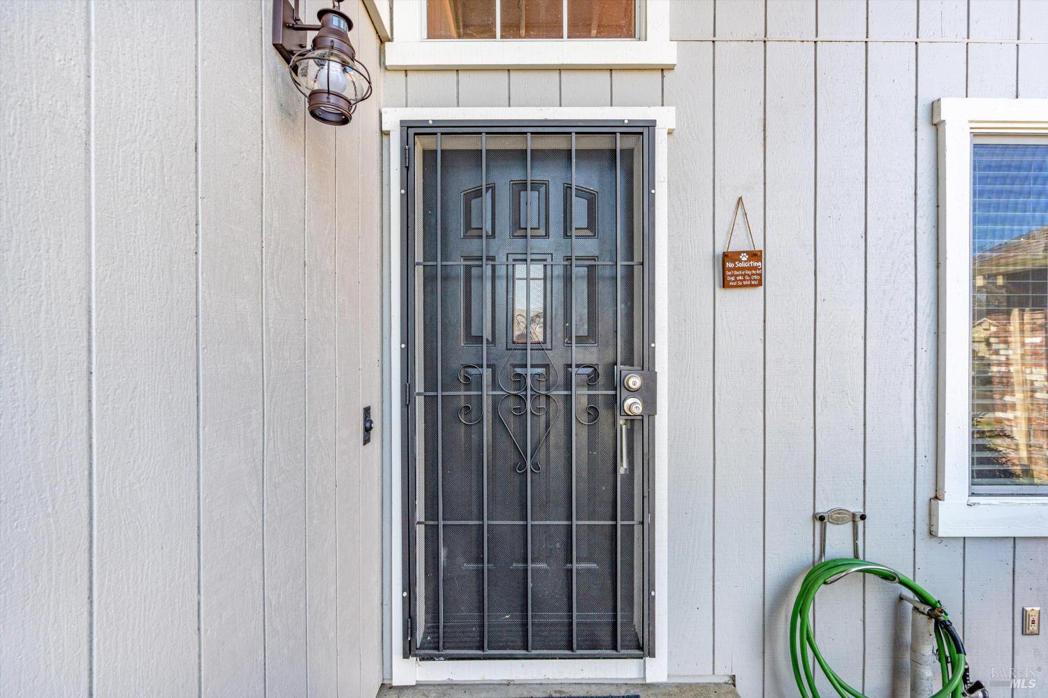 532 Walten Way Windsor, CA 95492 - Photo 12 of 65 a view of a door with a sink and a mirror