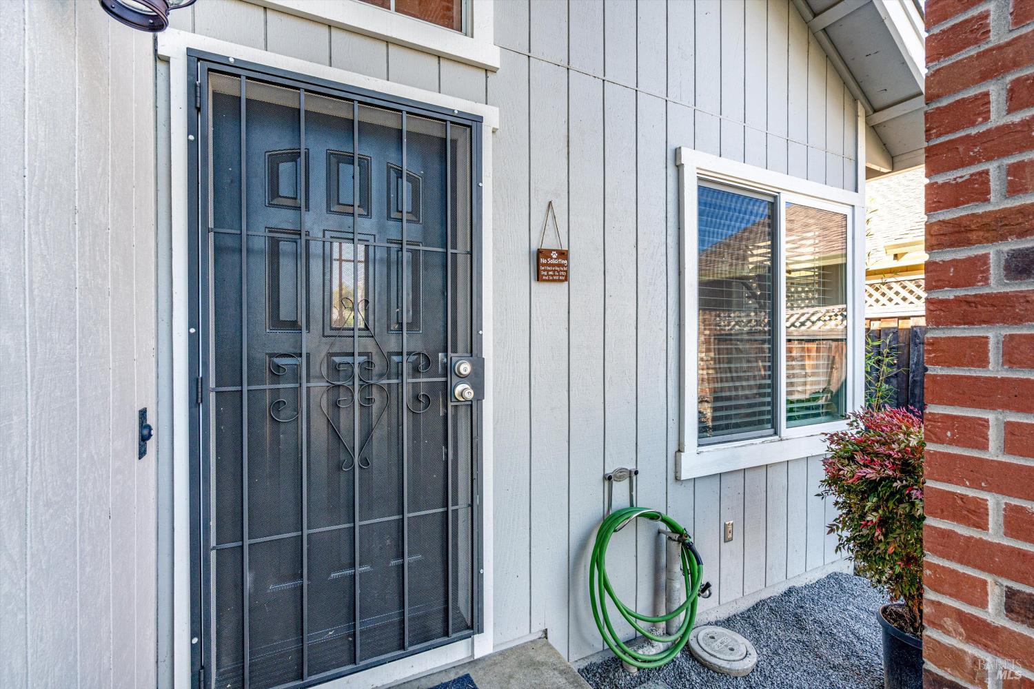532 Walten Way Windsor, CA 95492 - Photo 13 of 65 a backyard of a house with barbeque oven and glass windows