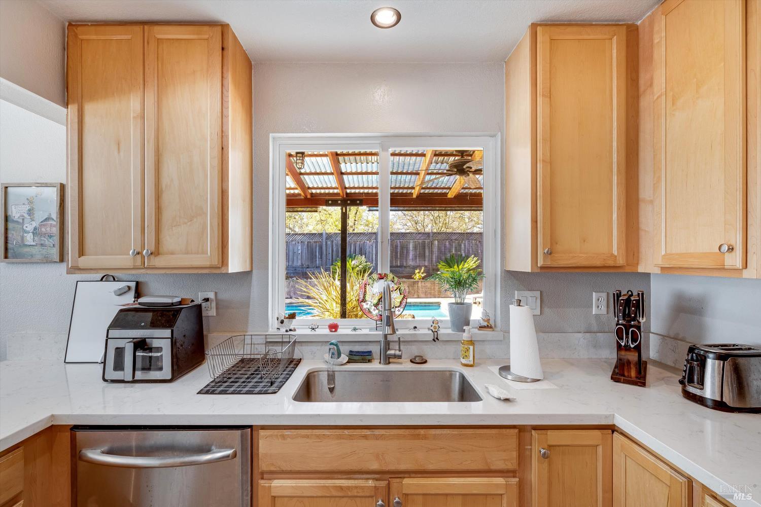 532 Walten Way Windsor, CA 95492 - Photo 28 of 65 a kitchen with a sink and a stove top oven