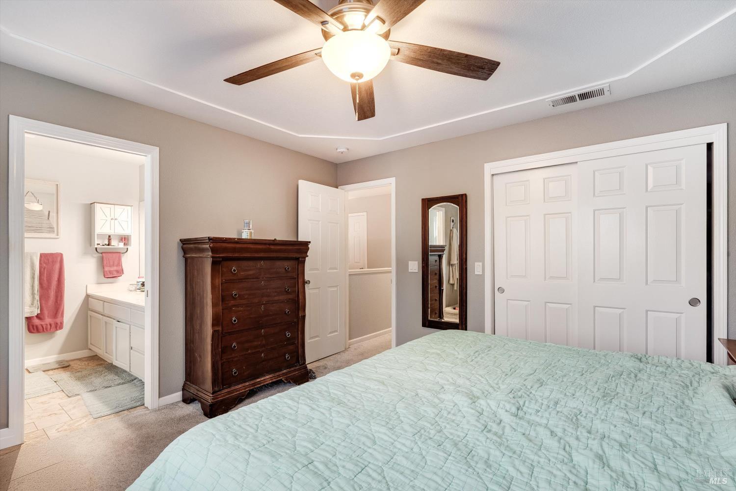 532 Walten Way Windsor, CA 95492 - Photo 36 of 65 a bed room with a bed and a walk in closet