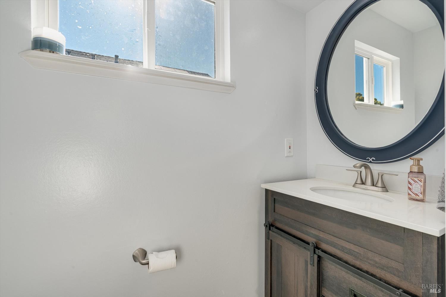 532 Walten Way Windsor, CA 95492 - Photo 47 of 65 a bathroom with a sink vanity and a mirror