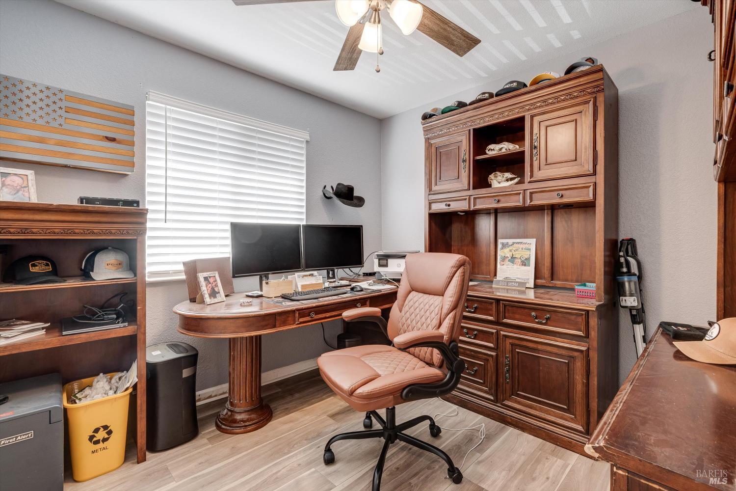 532 Walten Way Windsor, CA 95492 - Photo 48 of 65 a living room with furniture a flat screen tv and kitchen view