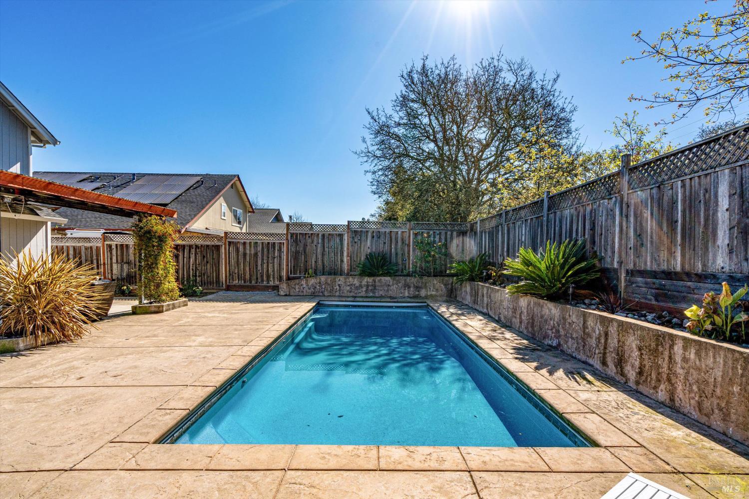 532 Walten Way Windsor, CA 95492 - Photo 54 of 65 a swimming pool with wooden fence