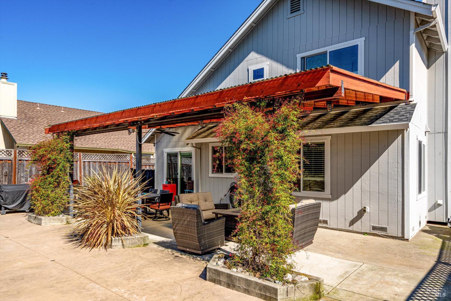 532 Walten Way Windsor, CA 95492 - Photo 58 of 65 a view of a house with wooden floor and potted plants