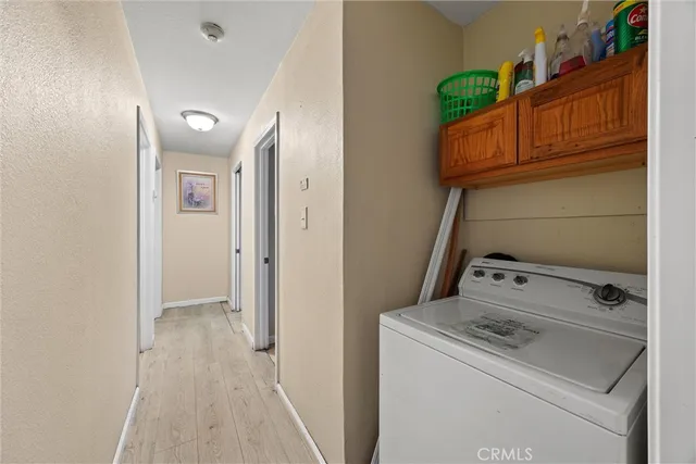 a bathroom with a sink toilet and a mirror