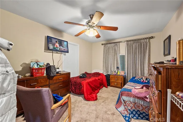 a view of a backyard with sitting area