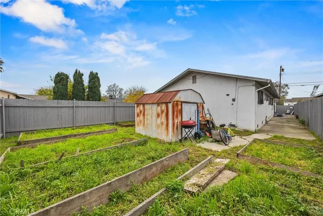 a view of a patio with wooden floor and seating space