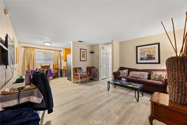 a kitchen with a sink a stove and cabinets