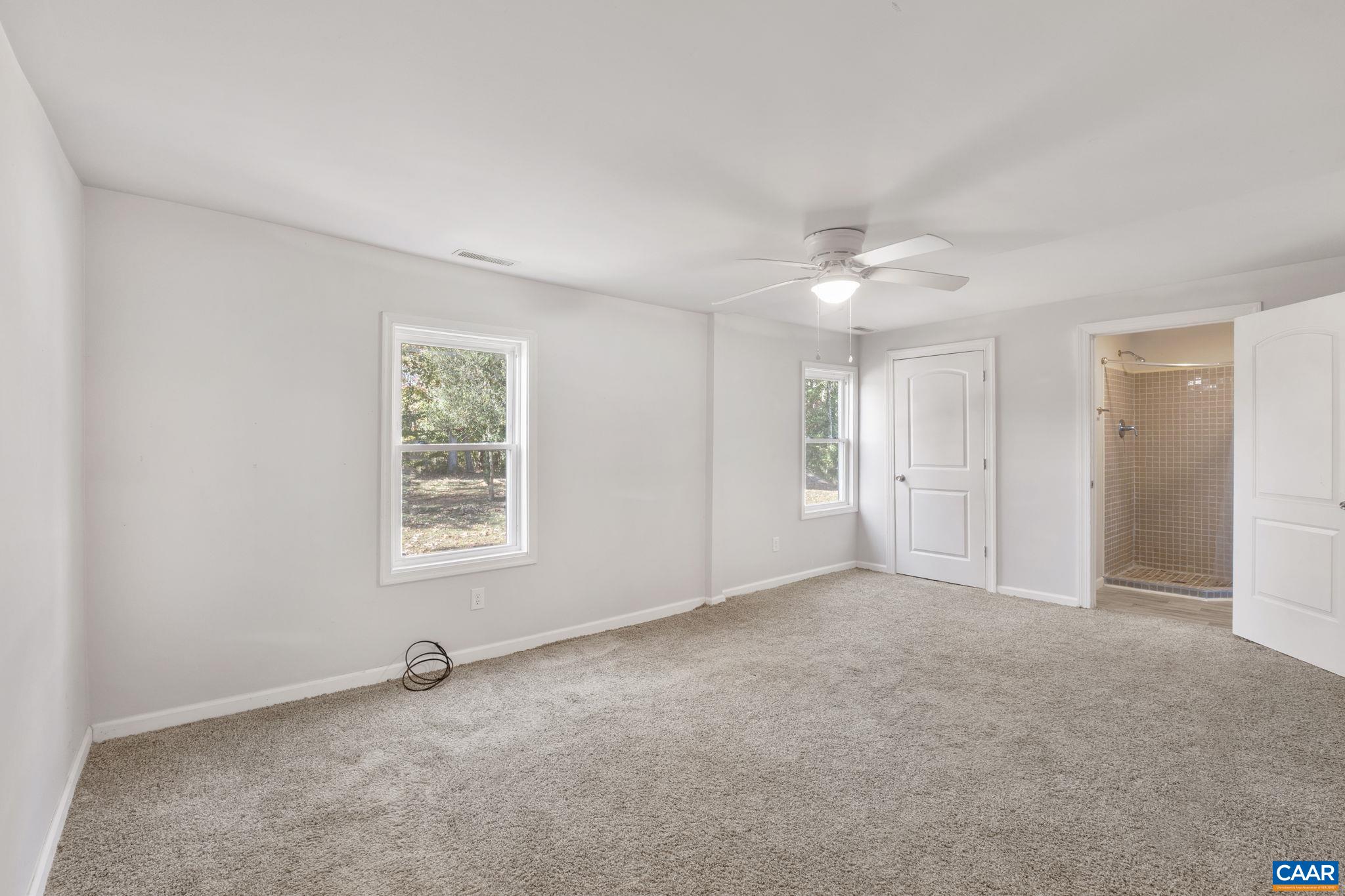 874 James River Road Scottsville, VA 24590 - Photo 21 of 43 a view of an empty room with a window