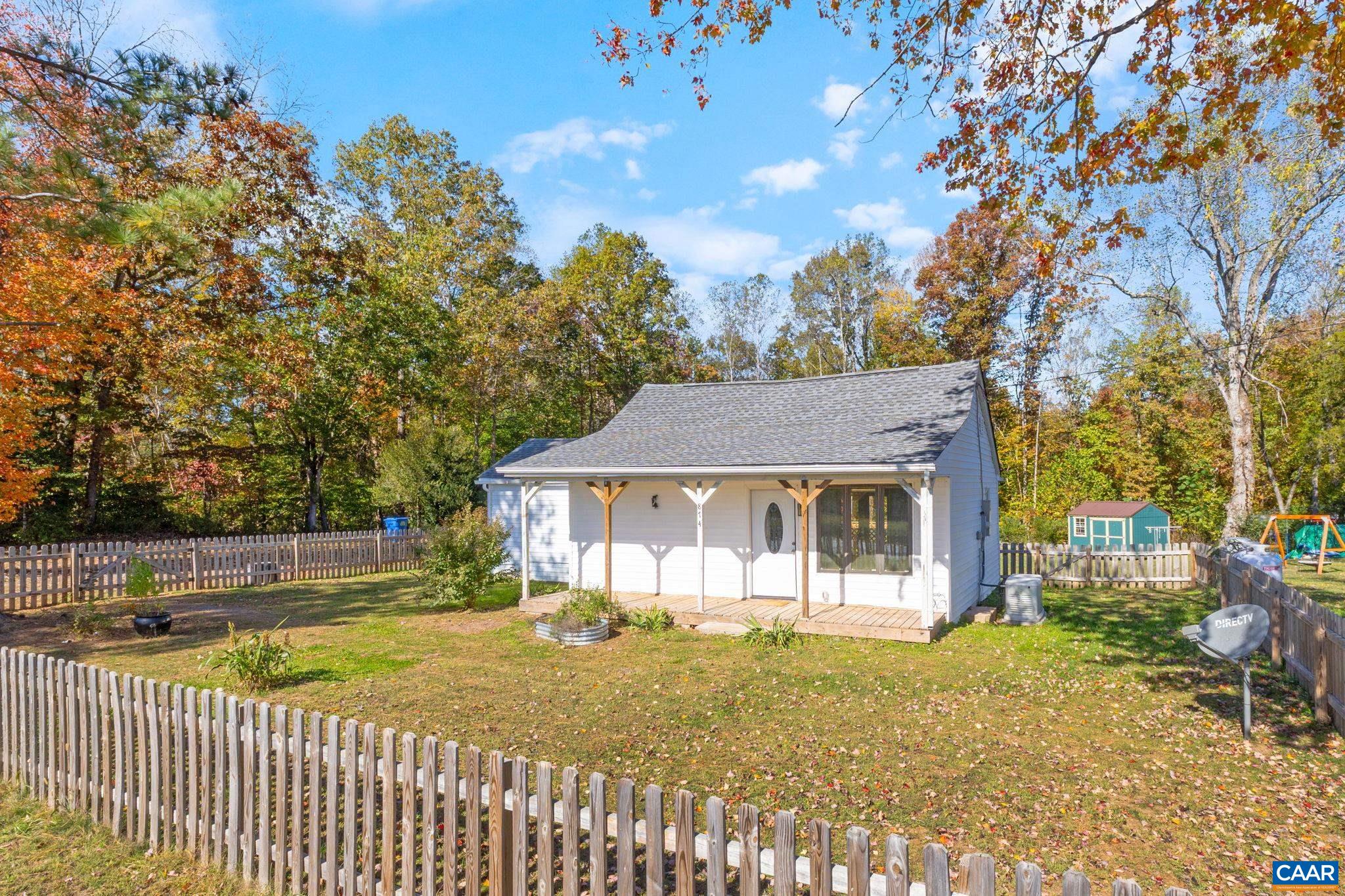 874 James River Road Scottsville, VA 24590 - Photo 32 of 43 a view of a house with a backyard