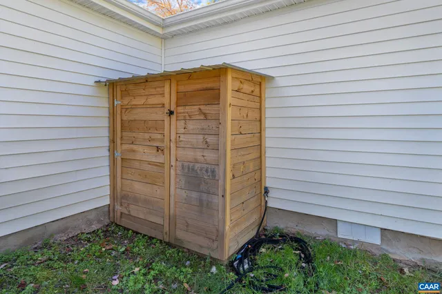 a view of a playground with basketball court