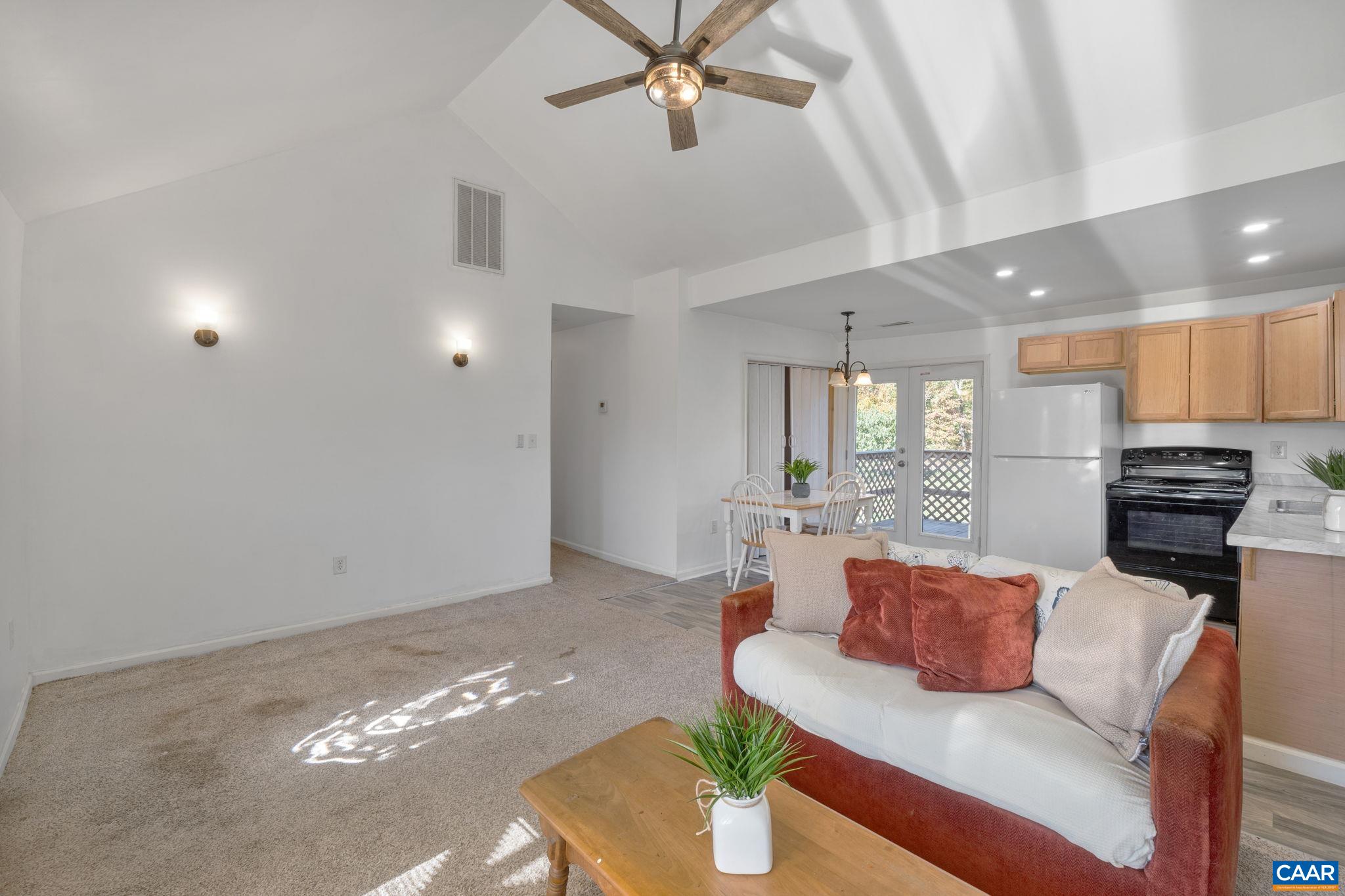 874 James River Road Scottsville, VA 24590 - Photo 7 of 43 a living room with furniture and kitchen view