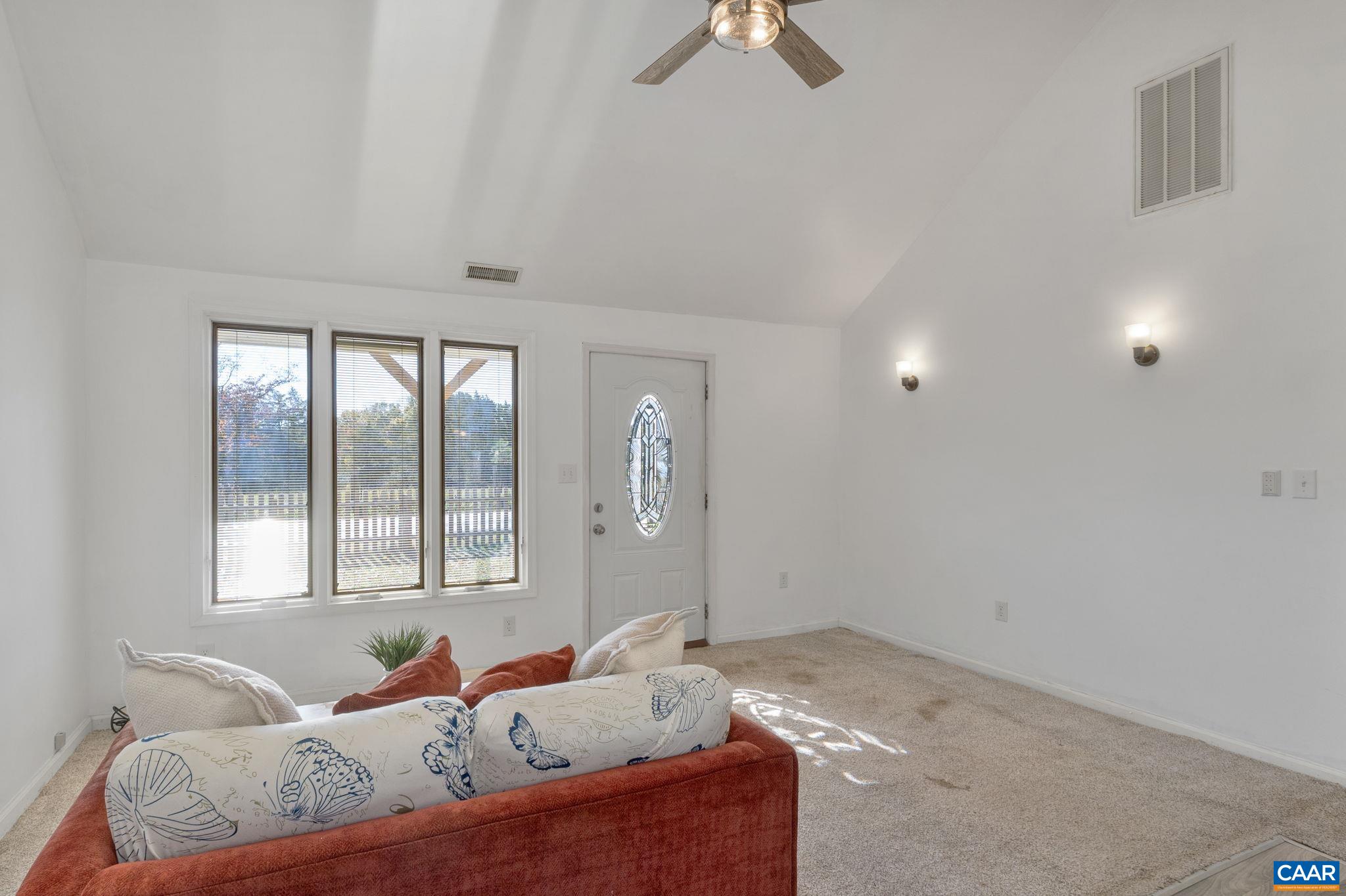 874 James River Road Scottsville, VA 24590 - Photo 8 of 43 a living room with furniture and window