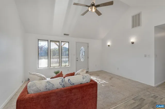a living room with furniture and window