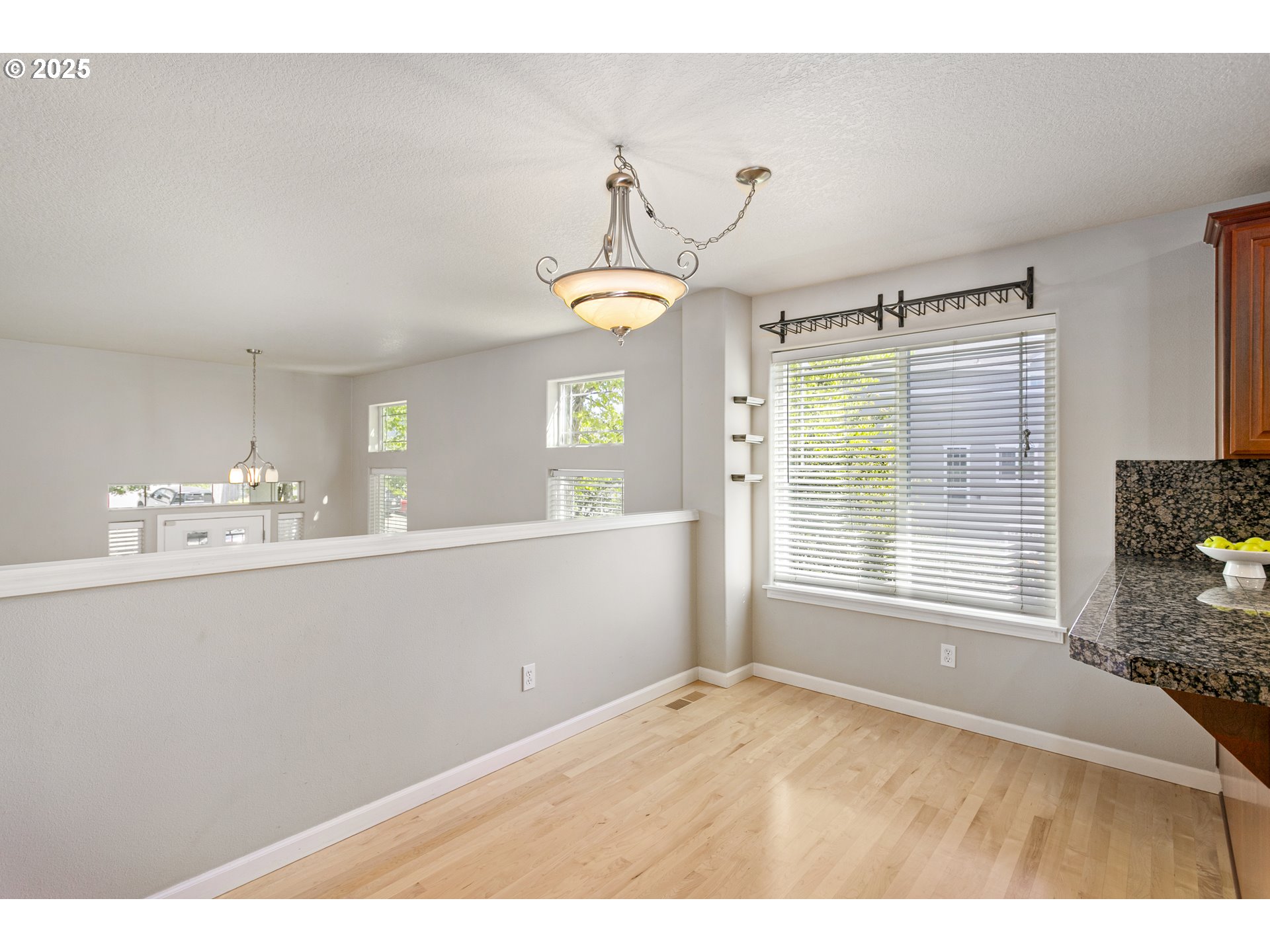 3200 Wild Rose Loop West Linn, OR 97068 - Photo 21 of 47 a bathroom with a sink windows and a mirror