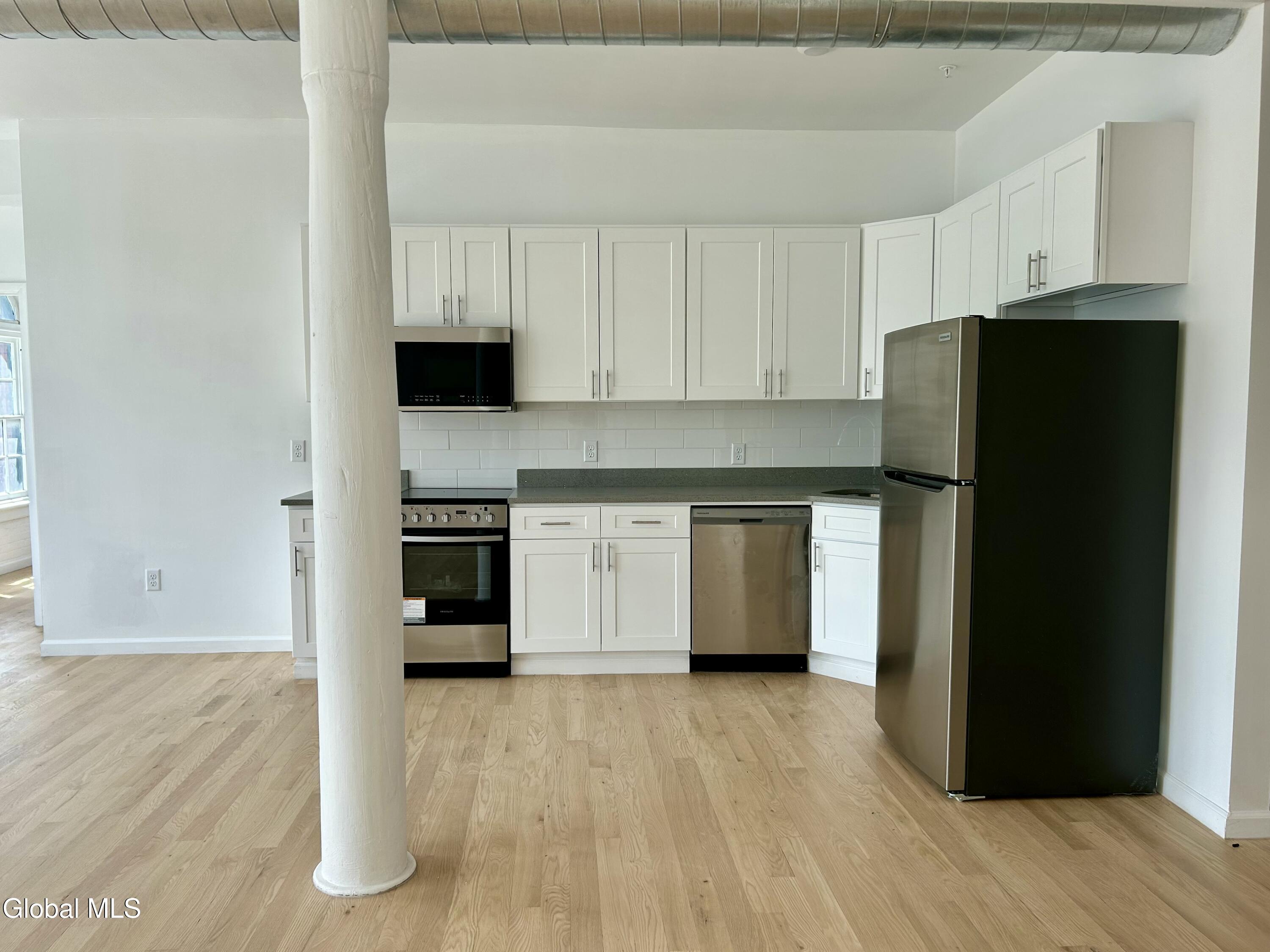 155 River Street, Unit 3D Troy, NY 12180 - Photo 12 of 19 3D Living Room & Kitchen