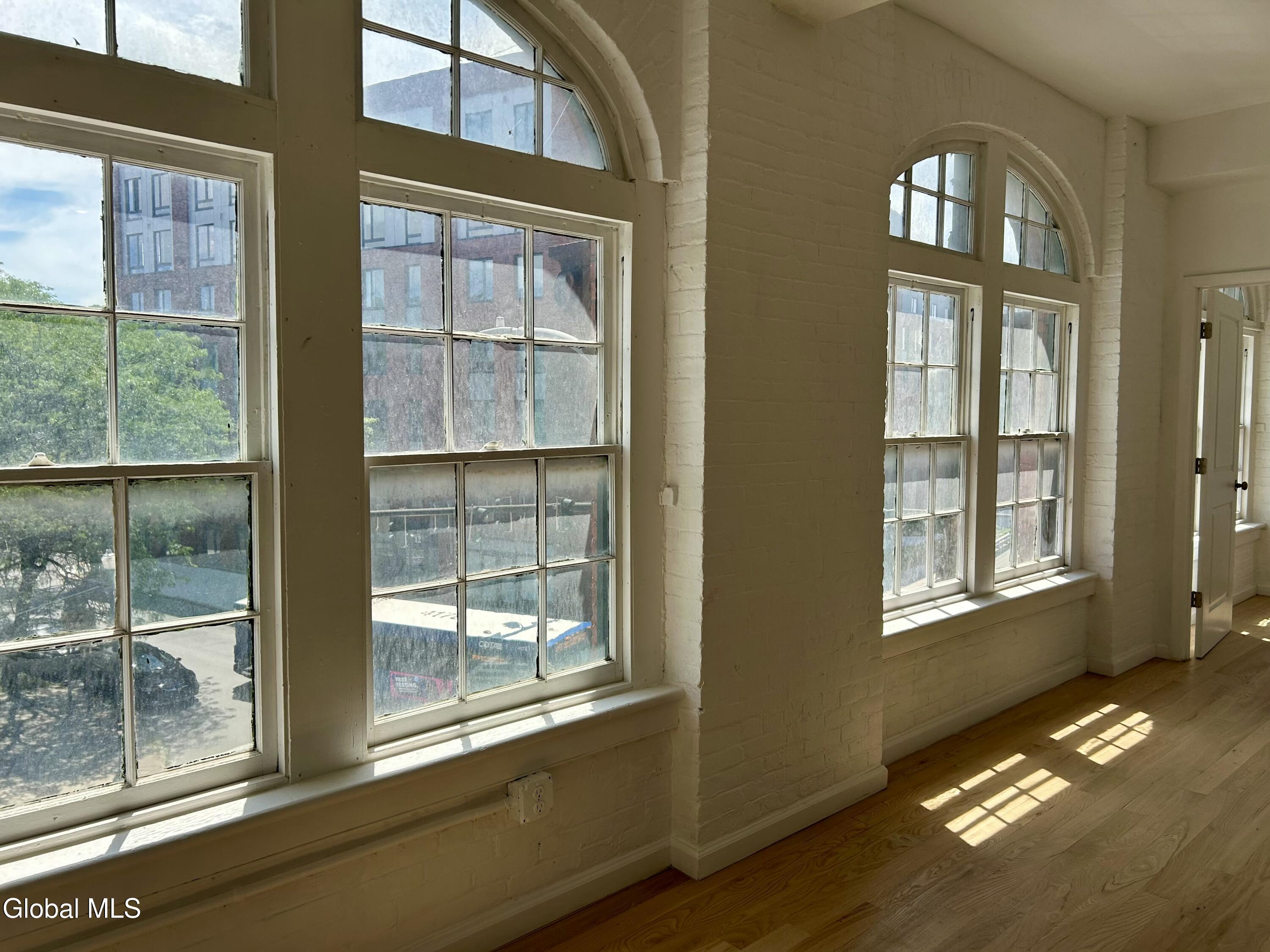 155 River Street, Unit 3D Troy, NY 12180 - Photo 3 of 19 3D Living Room Windows