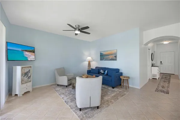 a living room with furniture and a window