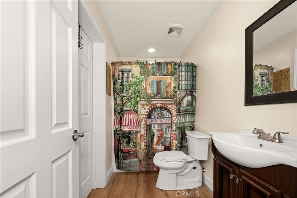 2728 Pentz Road Oroville, CA 95965 - Photo 38 of 52 a bathroom with a toilet sink and mirror