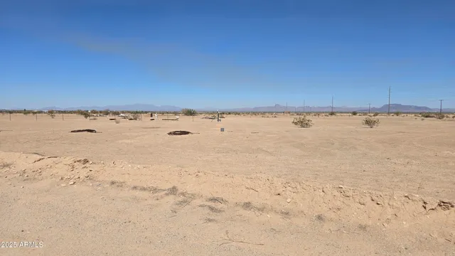 a view of a balcony with wooden floor
