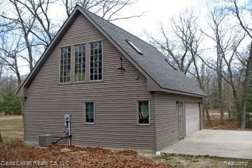 3235 Sand Road Port Austin, MI 48467 - Photo 11 of 13 3235SandRdSide2.jpg