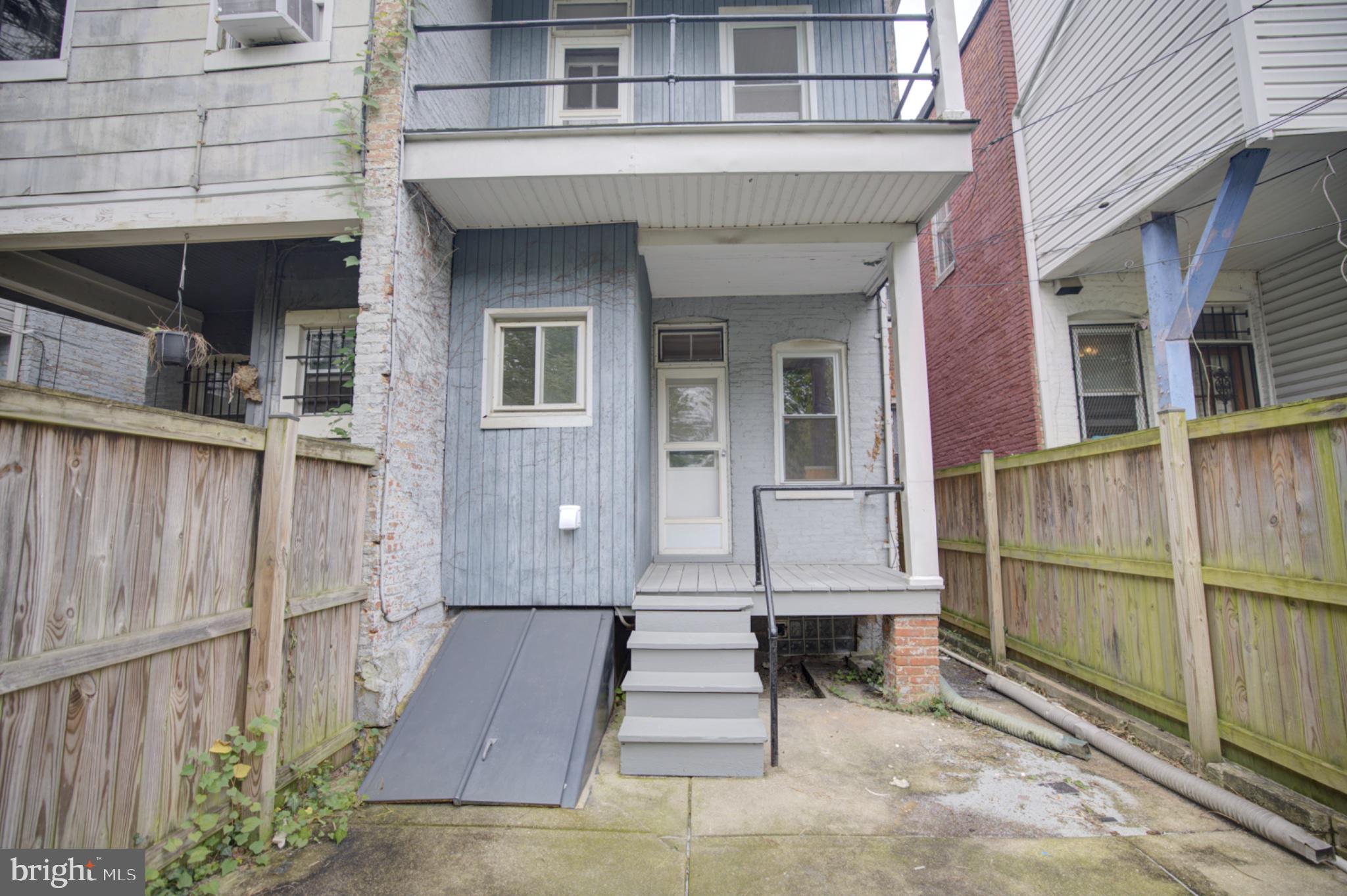 608 East 33rd Street Baltimore, MD 21218 - Photo 16 of 17 Rear porch and backyard