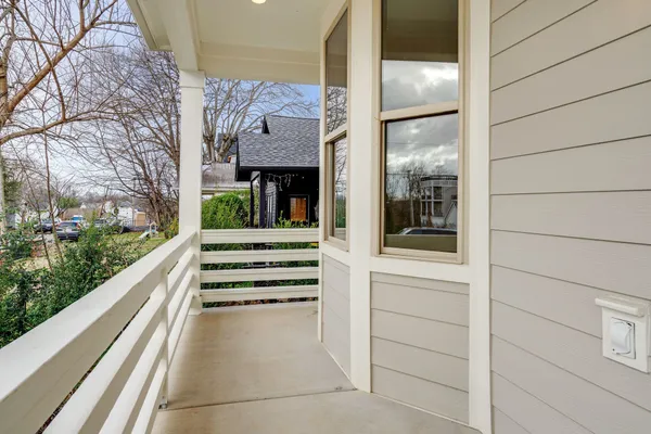 a view of a balcony with an outdoor space