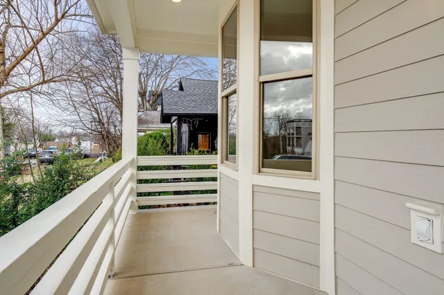 a view of a balcony with an outdoor space