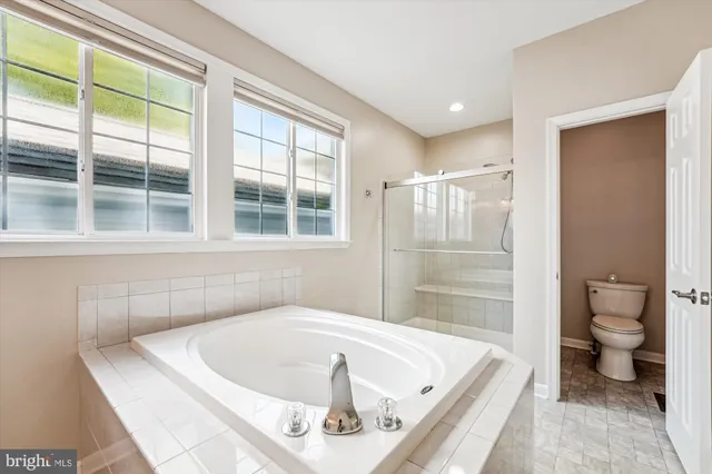 a bathroom with a sink a vanity and a mirror