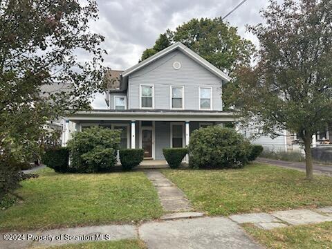 1543 Capouse Avenue Scranton, PA 18509 - Photo 1 of 62 a view of house with garden