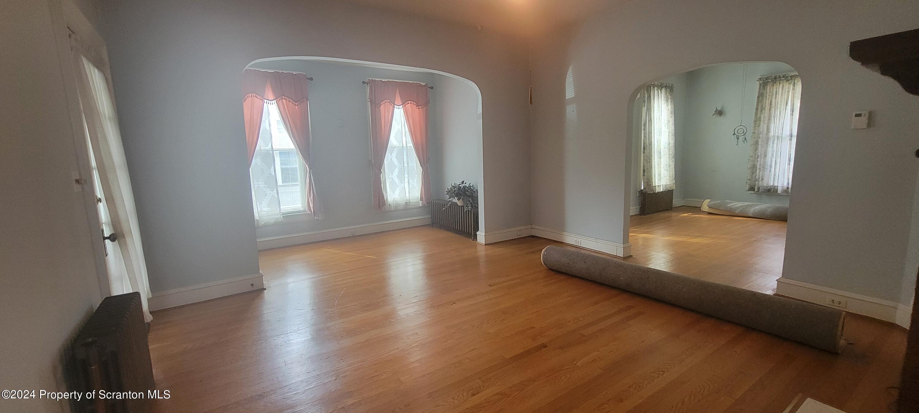 1543 Capouse Avenue Scranton, PA 18509 - Photo 14 of 62 a view of livingroom with workspace