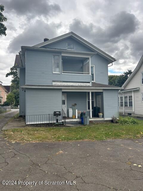 1543 Capouse Avenue Scranton, PA 18509 - Photo 2 of 62 a front view of a house with a yard