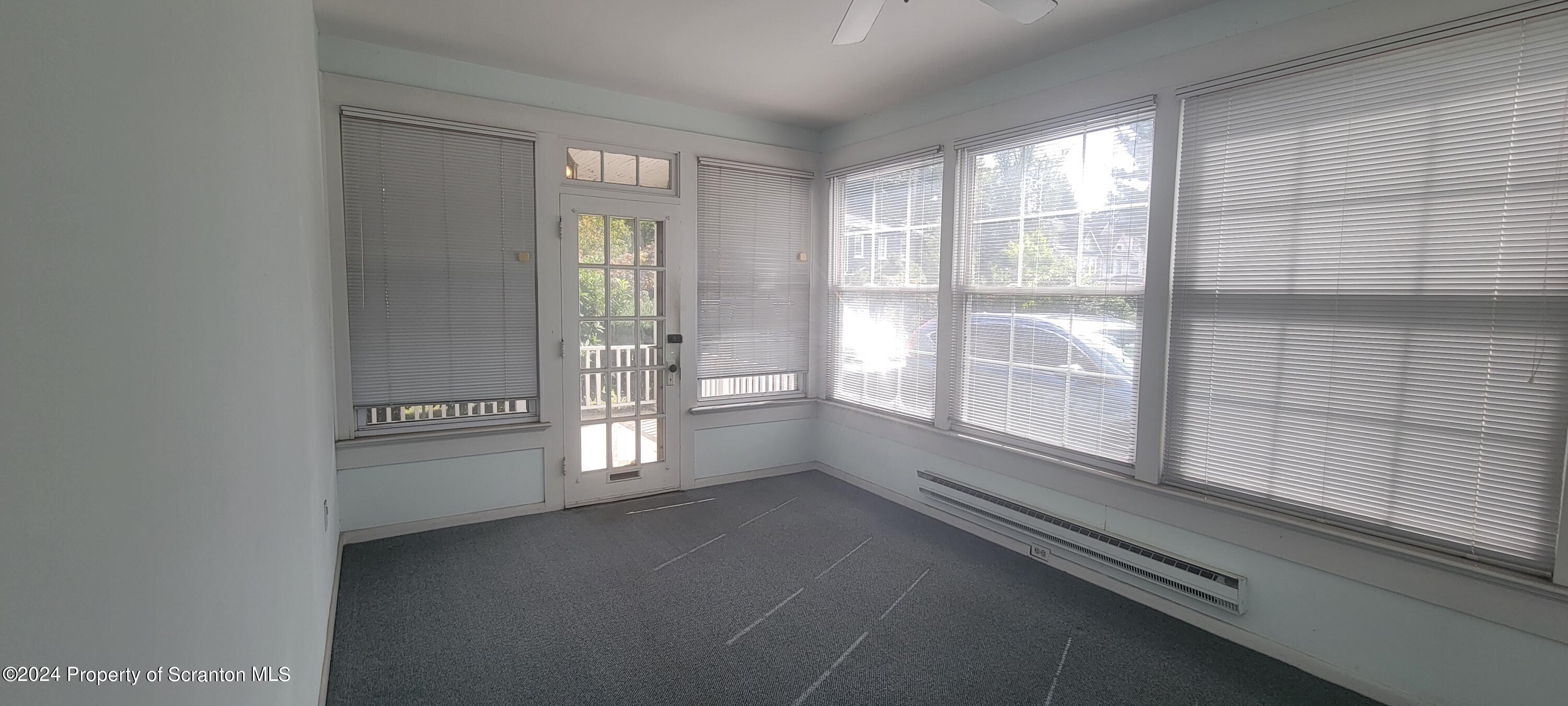 1543 Capouse Avenue Scranton, PA 18509 - Photo 25 of 62 a view of an empty room with a window