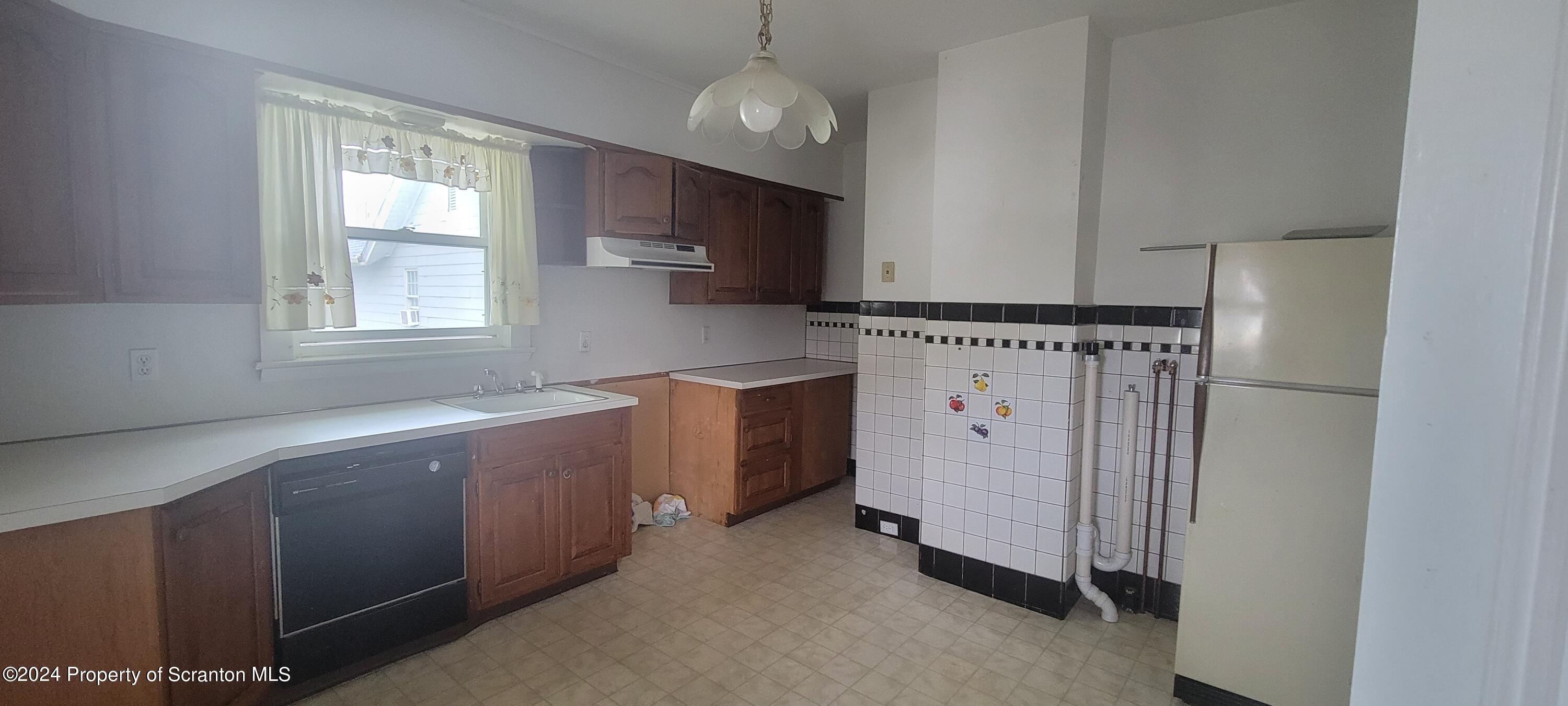 1543 Capouse Avenue Scranton, PA 18509 - Photo 31 of 62 a view of a kitchen with a window