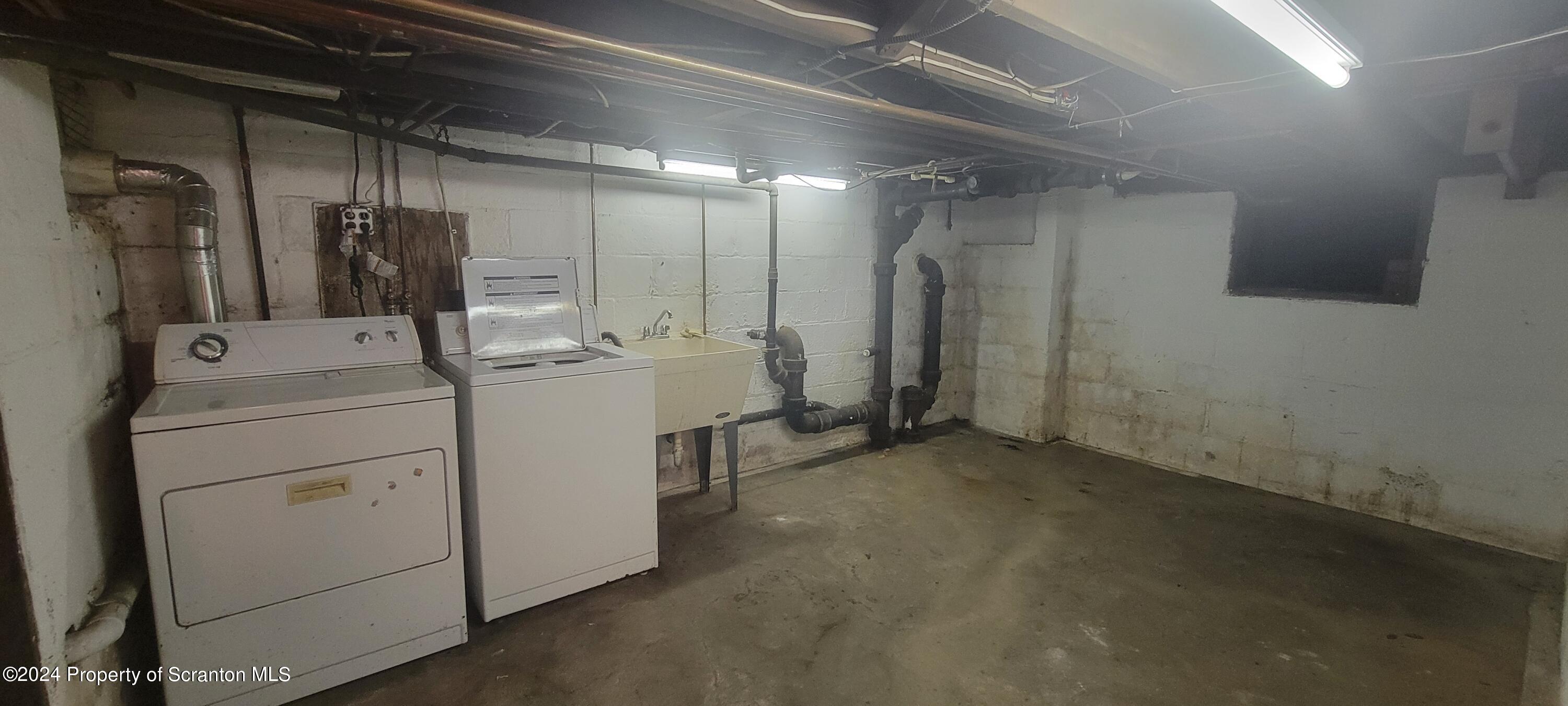1543 Capouse Avenue Scranton, PA 18509 - Photo 52 of 62 a utility room with dryer and washer