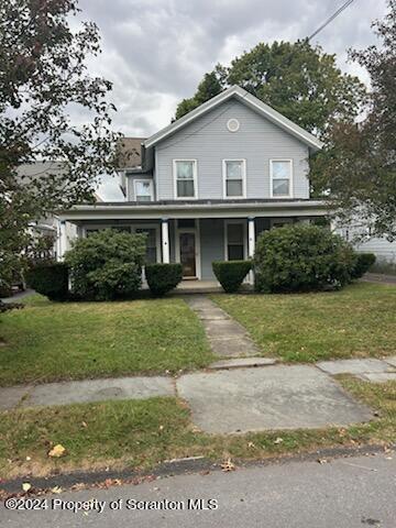 1543 Capouse Avenue Scranton, PA 18509 - Photo 62 of 62 a front view of a house with a yard