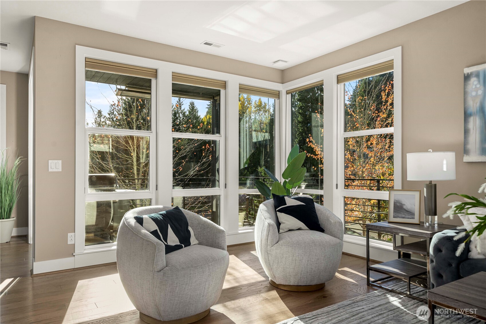 9710 Main Street, Unit A Bothell, WA 98011 - Photo 3 of 7 a living room with furniture and a large window
