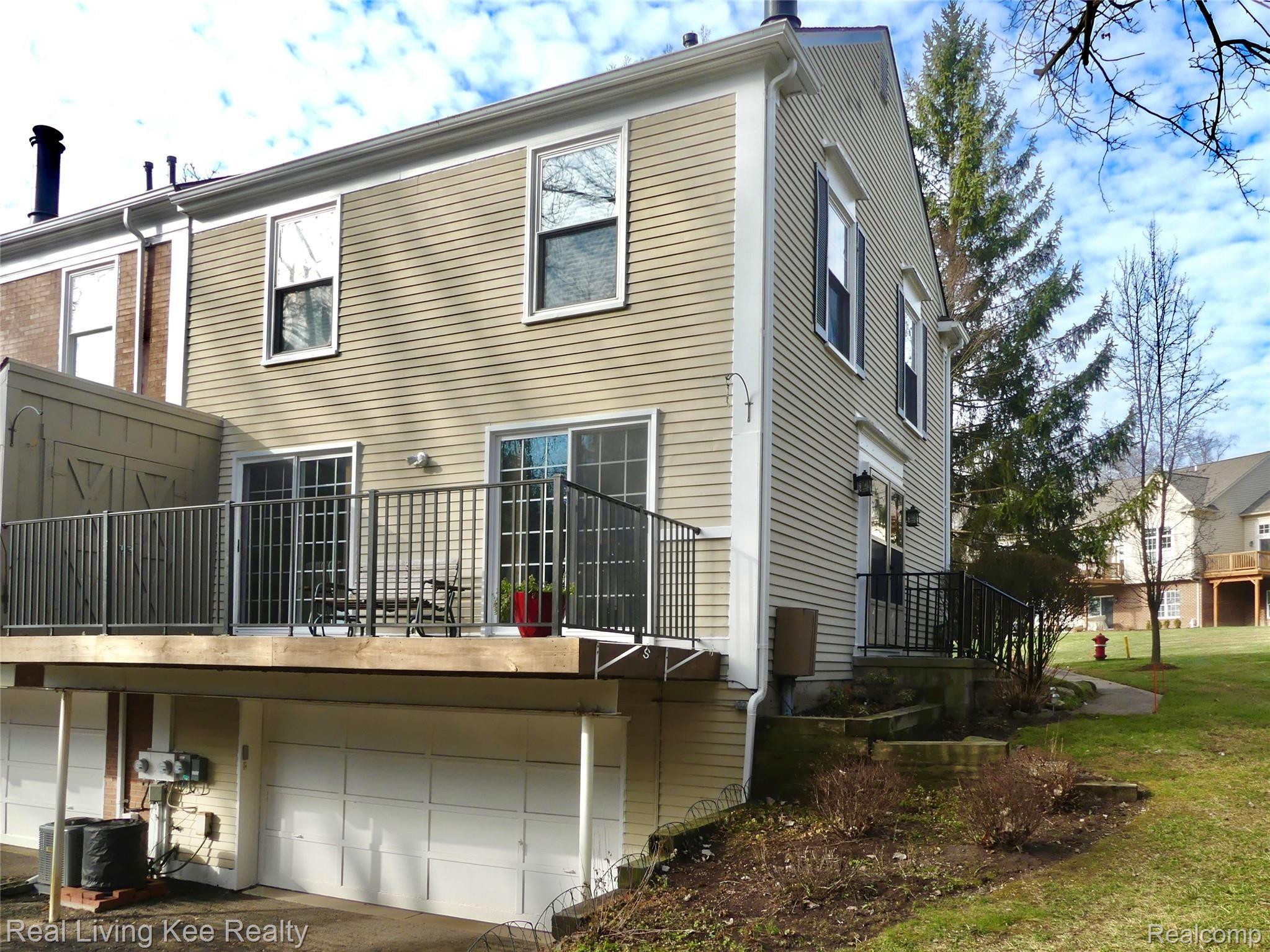 1326 Brook Lane Rochester, MI 48306 - Photo 43 of 47 End-unit with wooded views, 2 1/2 car garage & large private balcony