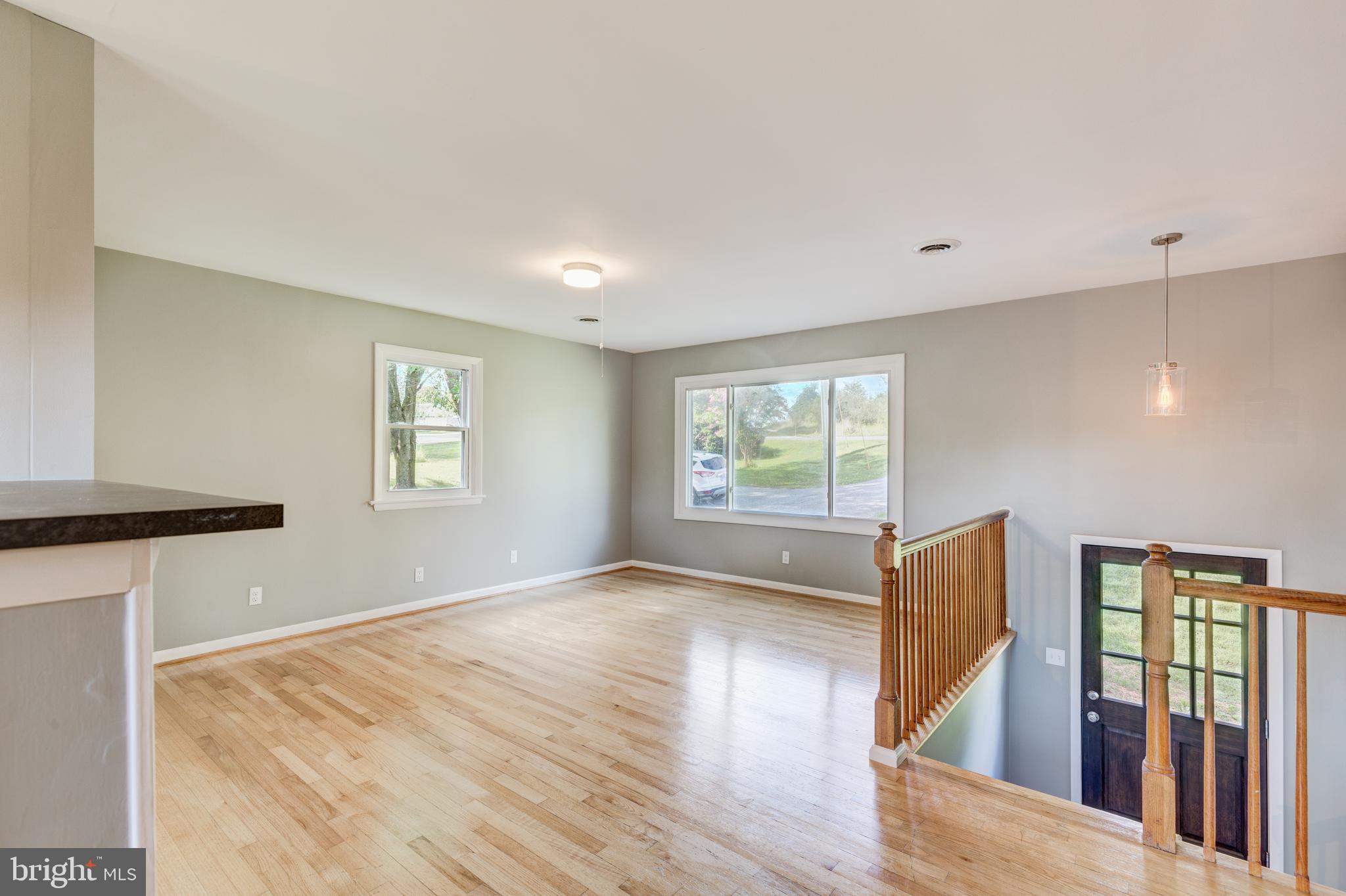 88 East Nicodemus Road Westminster, MD 21157 - Photo 11 of 43 Hardwood floors throughout family room and hallway