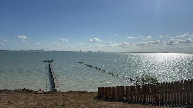 a view of ocean and mountain