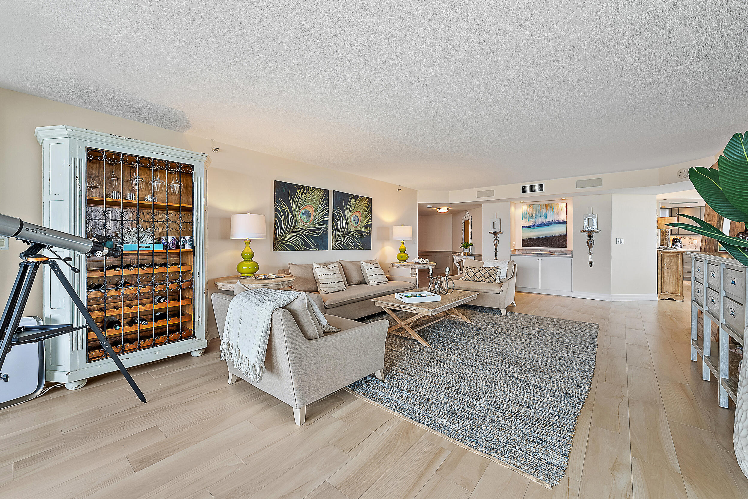 5200 North Ocean Drive, Unit 505 Singer Island, FL 33404 - Photo 11 of 30 a living room with furniture and wooden floor