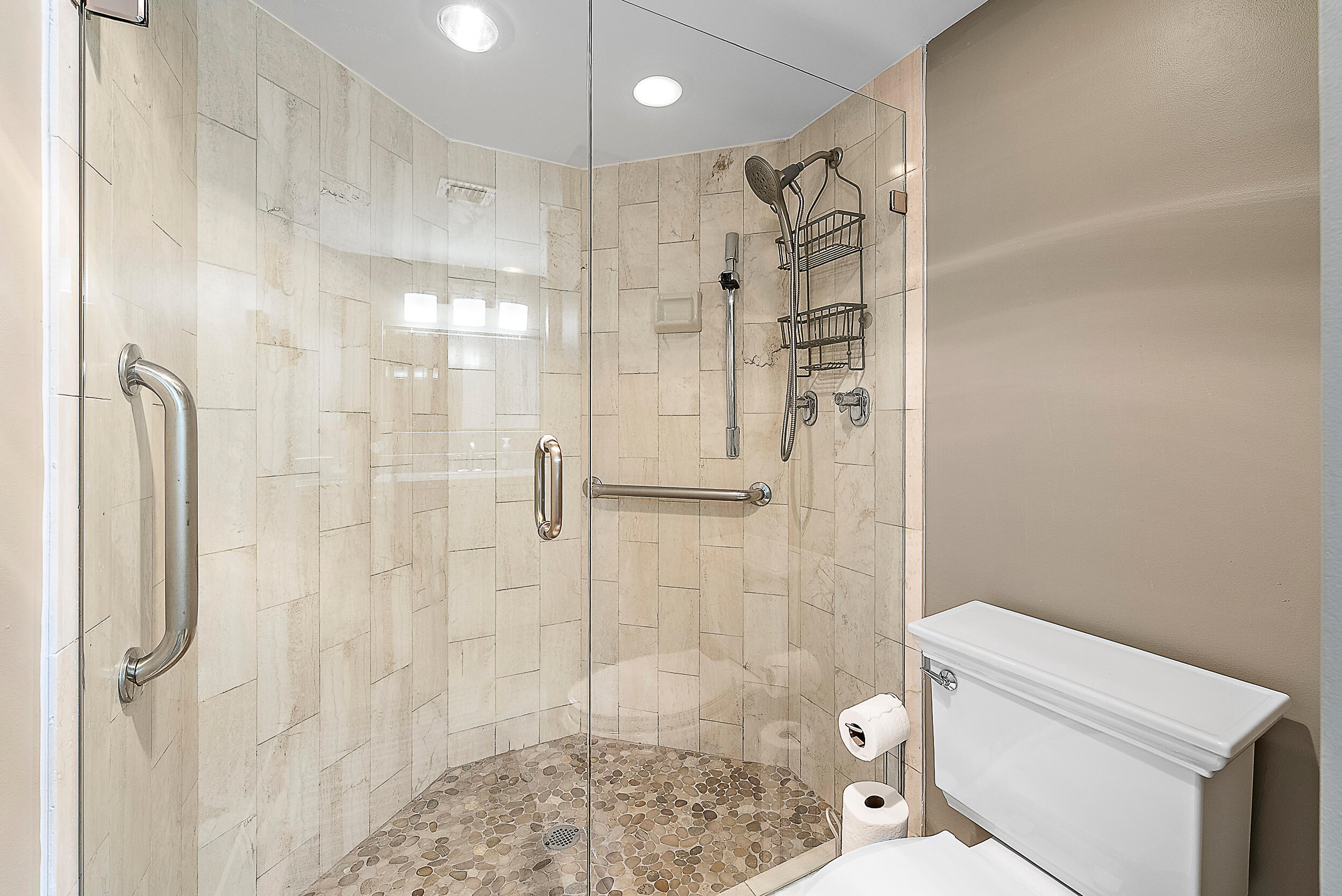 5200 North Ocean Drive, Unit 505 Singer Island, FL 33404 - Photo 16 of 30 a bathroom with a shower and a toilet