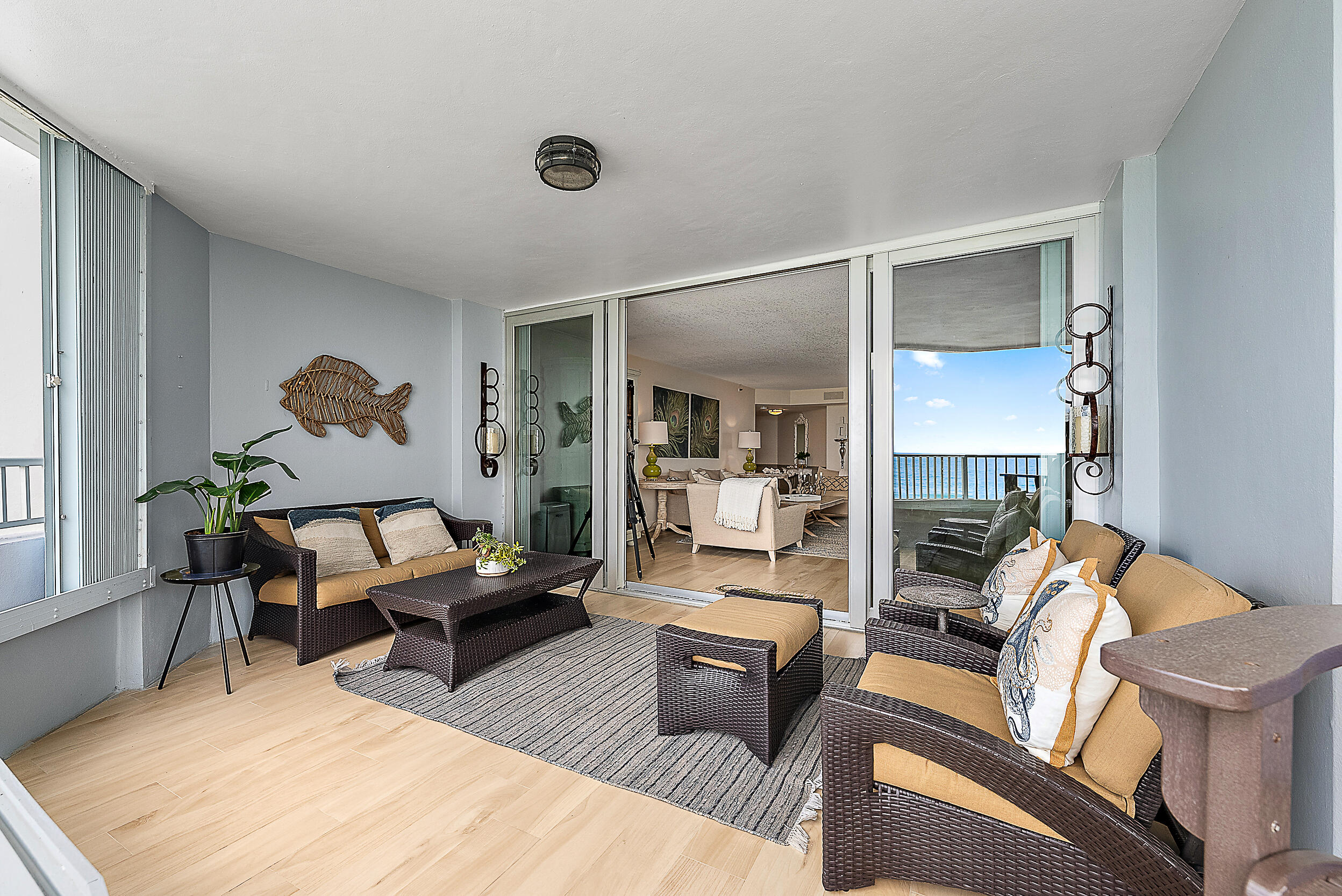 5200 North Ocean Drive, Unit 505 Singer Island, FL 33404 - Photo 21 of 30 a living room with furniture and wooden floor