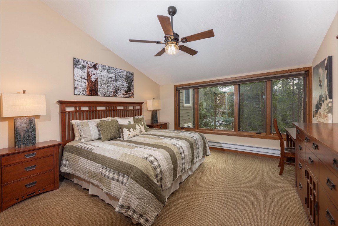 21630 Highway 6, Unit 2145 Keystone, CO 80435 - Photo 18 of 39 a bedroom with a bed and a large window