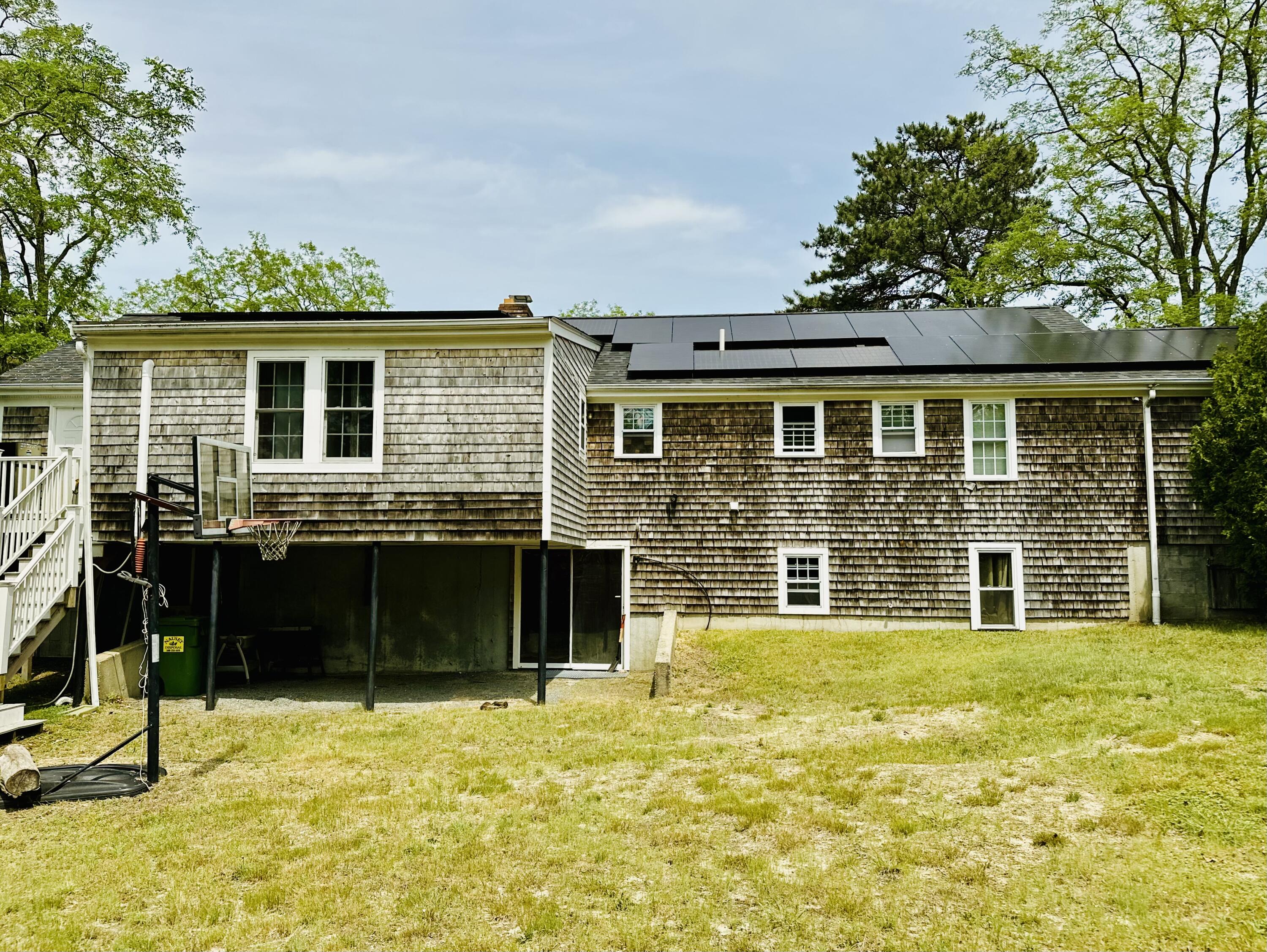7 Ebenezer Road Osterville, MA 02655 - Photo 11 of 16 a front view of a house with a yard