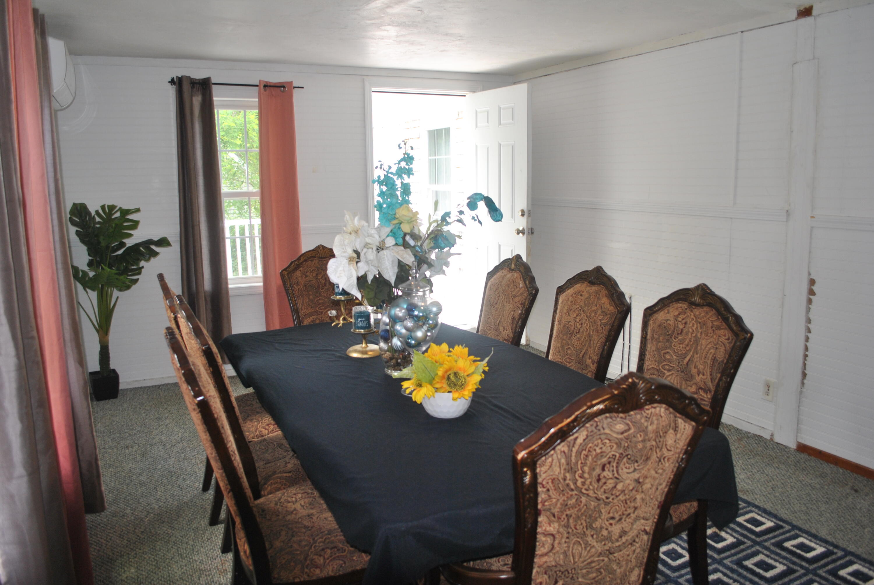 7 Ebenezer Road Osterville, MA 02655 - Photo 14 of 16 a view of a dining room with furniture and window