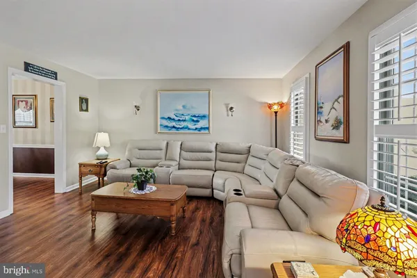 a view of a wooden deck and a yard