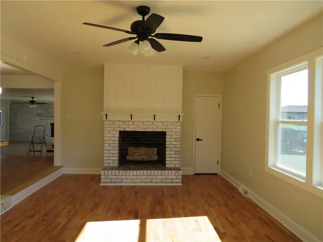 a living room with a fireplace