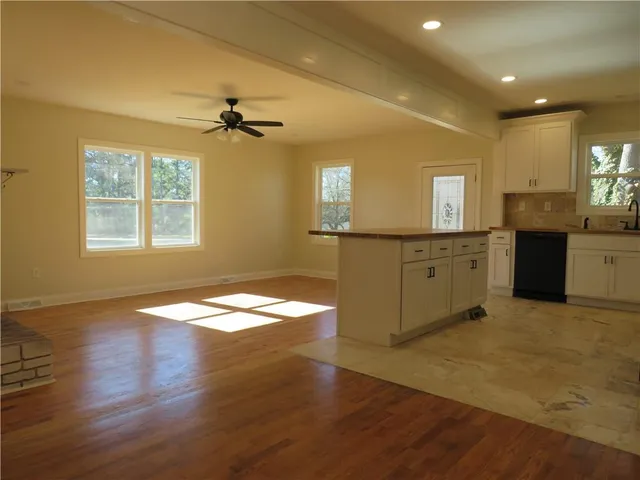 an empty room with windows